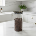 Clear glass storage jar with black and gold marble lid — lifestyle photography